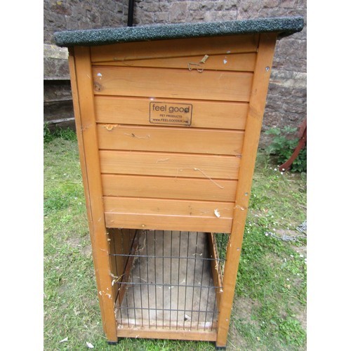 1227 - A two tier wooden rabbit hutch with hinged lid 105 cm high x 120 cm wide