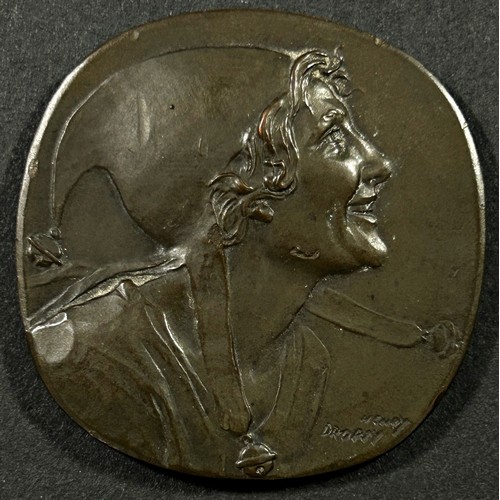 373 - A bronze ‘jester’ medallion by Henry Dropsy, signed lower right,  5cm diameter