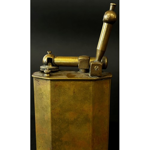 376 - A large French brass table cigarette lighter by Polaire Paris, 10cm high.