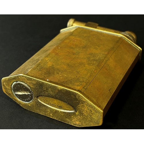 376 - A large French brass table cigarette lighter by Polaire Paris, 10cm high.