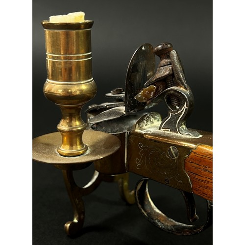 377 - An Italian novelty reproduction tinder pistol table lighter with flintlock action brass framework an... 