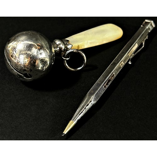 379 - A small collection of bijouterie to include an infant’s silver plated rattle, a yard of lead pencil,... 