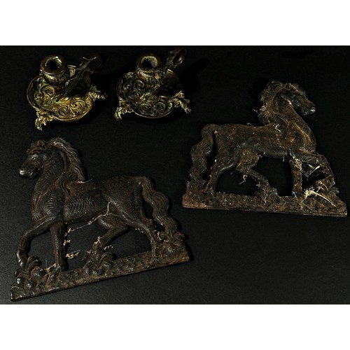 381 - A pair of antique cast iron horse mounts, 17 x 16cm, together with a small pair of Victorian brass c... 