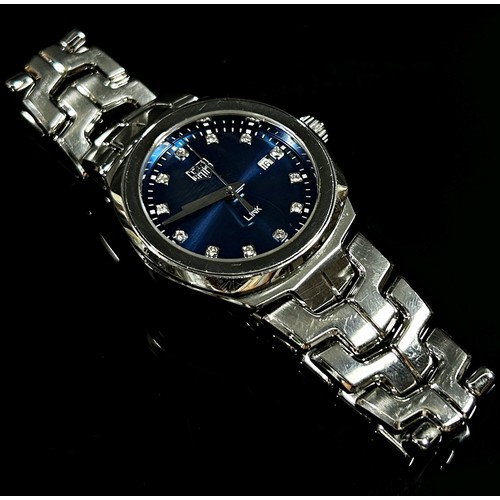 412 - Tag Heuer: A ladies’ stainless steel ‘LINK’, with blue metalic dial, with diamond spacers and date a... 