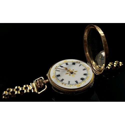 414 - An Edwardian 9ct yellow gold cased Swiss fob watch, the enamel dial with Roman numerals with gilt bo... 