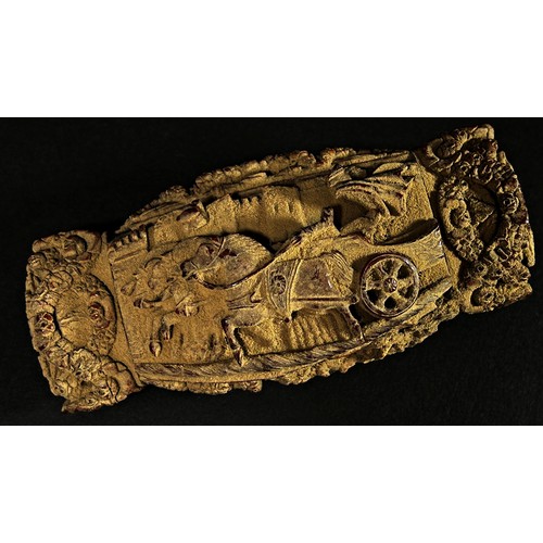 378 - A large 19th century coquilla nut snuff box, with hinged cover, profusely carved with a chariot scen... 