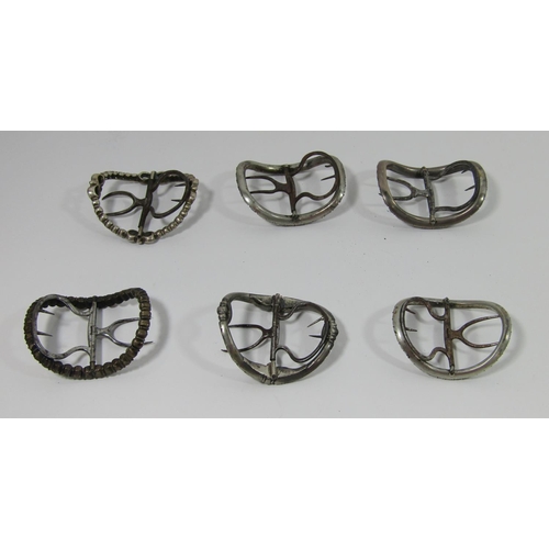 348 - Six Georgian black dot paste set buckles of various design