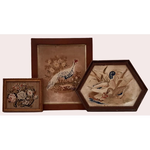 1955 - Three 19th century framed tapestries, to include: a bouquet of flowers, 19 x 22.5 cm; pheasant in a ... 