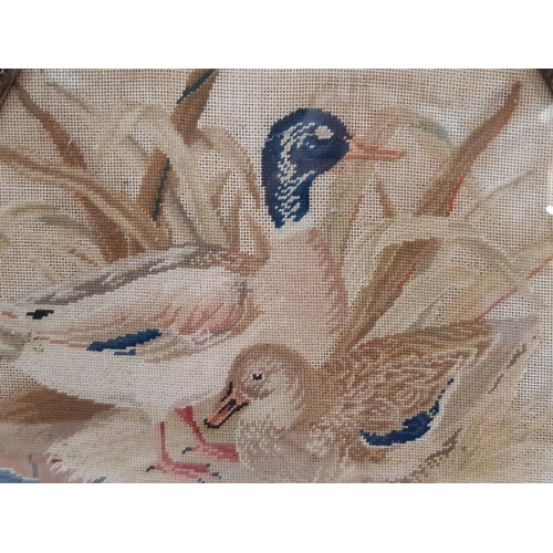 1955 - Three 19th century framed tapestries, to include: a bouquet of flowers, 19 x 22.5 cm; pheasant in a ... 