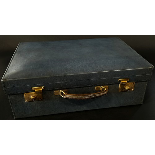 233 - A good Edwardian cased travelling vanity case, with brass lock plates, in stitched blue leather with... 