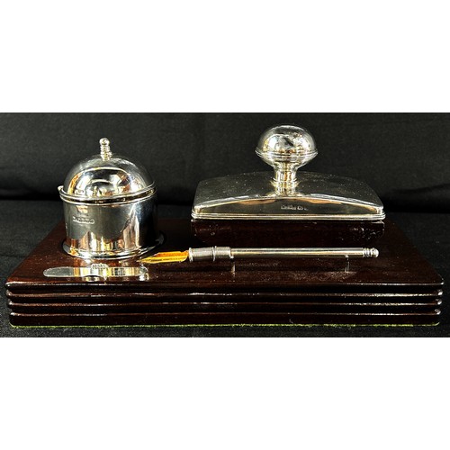 235 - A silver pen and inkstand with a silver inkwell and blotter and a small hinged space for a selection... 