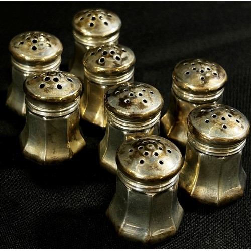 236 - Eight silver Cartier miniature salt and pepper pots stamped Cartier silver to the base, in their ori... 