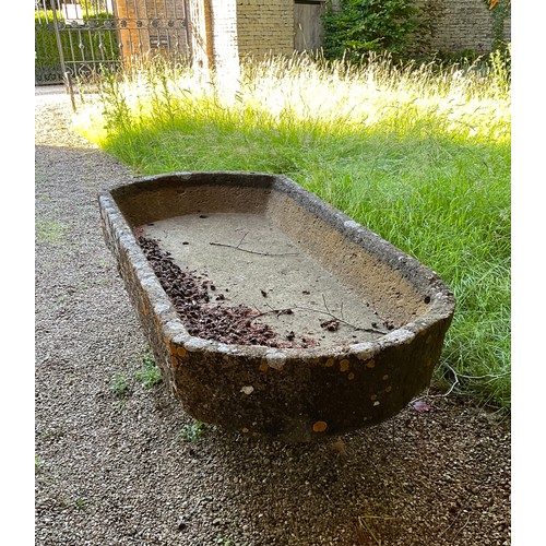 1011 - An exceptional large weathered natural stone planter / trough of rounded rectangular / cartouche for... 