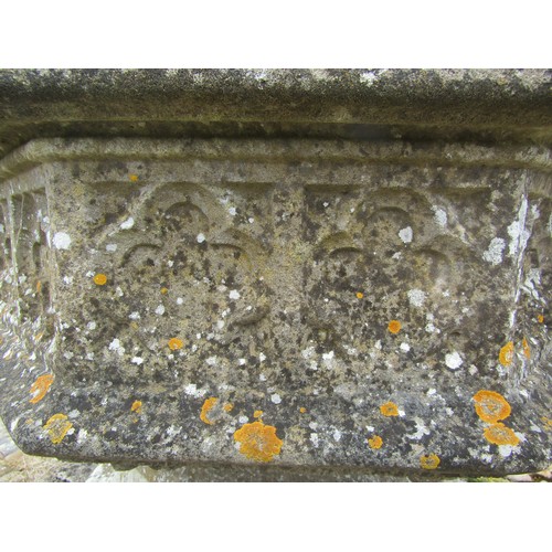 1015 - A large and impressive weathered carved composition sectional stone font / planter of octagonal form... 