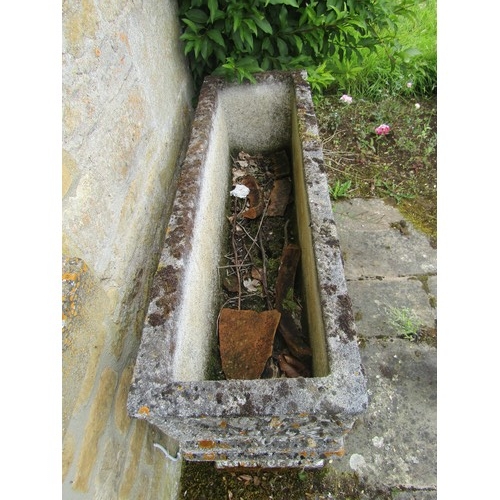 1016 - A weathered carved composition stone planter of rectangular form with moulded detail in the Adam sty... 