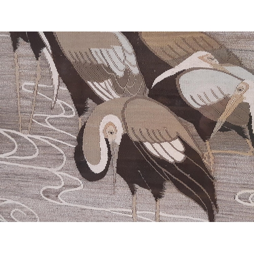 1938 - A vintage tapestry of seven cranes standing in water, possibly Japanese, colour thread with silver t... 