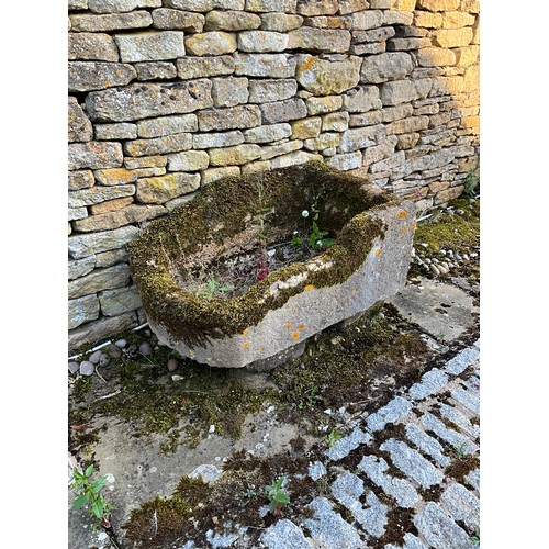 1024 - A weathered lychen covered natural stone planter / trough of rounded rectangular form (with consider... 