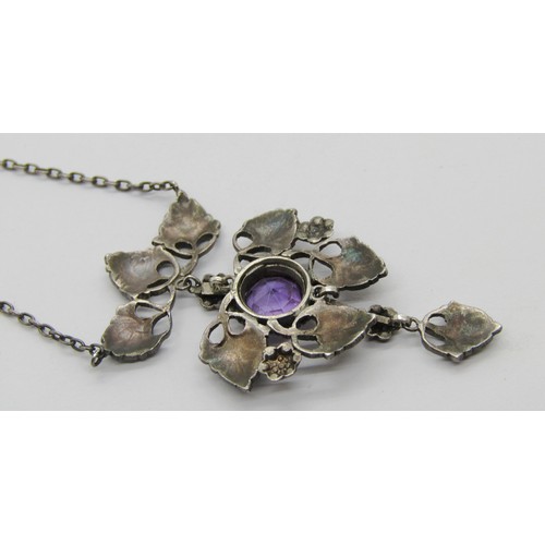 327 - Arts & Crafts enamelled silver articulated pendant necklace, bezel set with a circular amethyst, in ... 