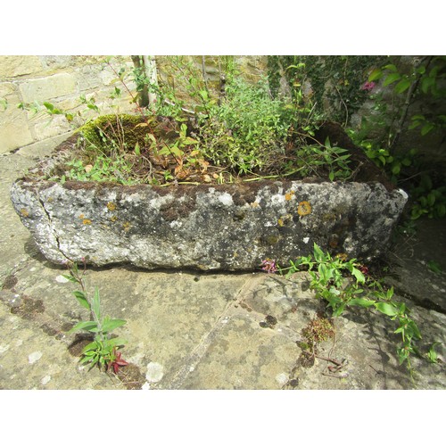 1030 - A large weathered lychen covered rectangular natural stone planter / trough of rectangular form, of ... 