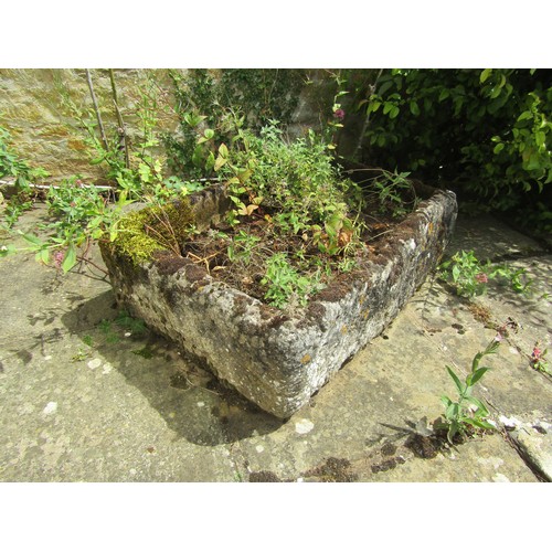 1030 - A large weathered lychen covered rectangular natural stone planter / trough of rectangular form, of ... 