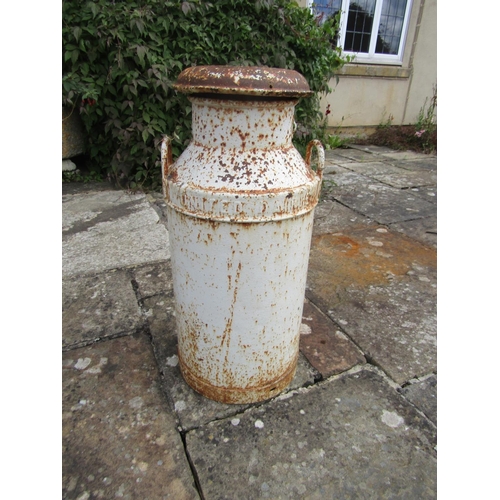 1041 - An old weathered United Dairies milk churn. 

From the collection of a private North Cotswolds estat... 