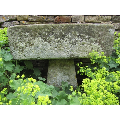 1055 - A neat weathered natural stone planter / trough of rectangular form raised on an associated staddle ... 