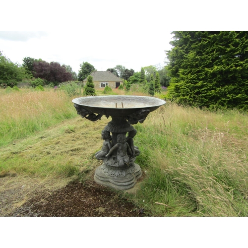 1059 - An impressive bronzed lead effect cast metal free-standing fountain, with seated putti and mask deta... 