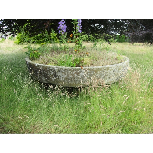 1061 - A huge and impressive antique weathered natural stone trough / lawn adornment of circular form, like... 