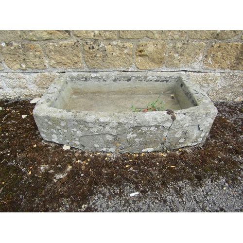 1062 - A weathered natural stone planter / trough of bowed rectangular form, 20cm high, 90 x 40cm together ... 