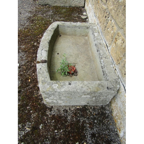 1062 - A weathered natural stone planter / trough of bowed rectangular form, 20cm high, 90 x 40cm together ... 