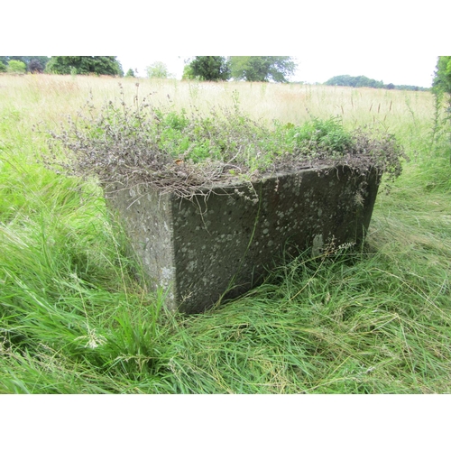 1074 - A large weathered natural stone planter / trough of demi-lune form (located in main lawn) 57cm high,... 