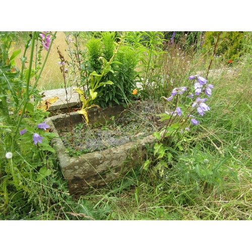 1077 - A small weathered natural stone planter / trough of rectangular form, 25cm high, 95 x 53cm.

From th... 