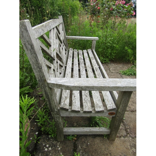 1092 - A weathered ‘Lister’ teak garden bench, 88cm high, 149cm wide.

From the collection of a private Nor... 