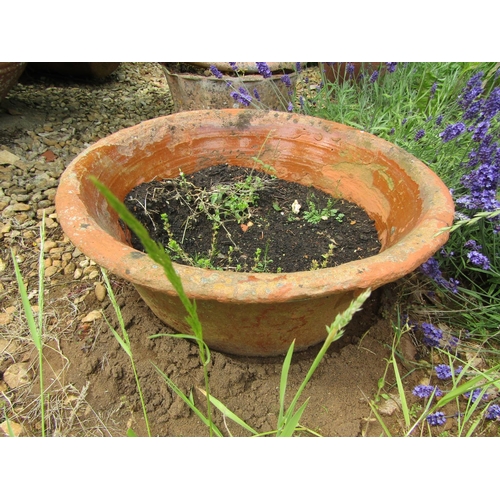 1103 - A group of small terracotta pots to include a dairy bowl (group)

From the collection of a private N... 