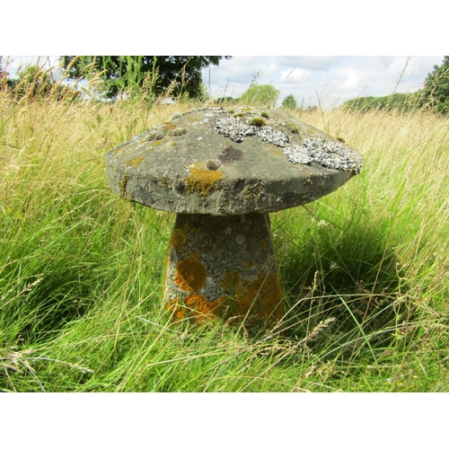 1110 - A weathered natural staddle stone and cap (2) 47 cm high, 46 cm cap diameter

From the collection of... 