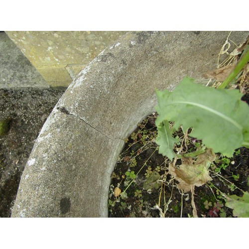 1064 - A pair of weathered cast composition stone planters of tapering cylindrical form with moulded garlan... 