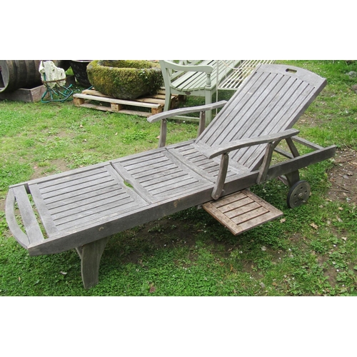 1178 - A Bramblecrest weathered (silvered) teak two wheeled garden sun lounger with adjustable slated seat ... 