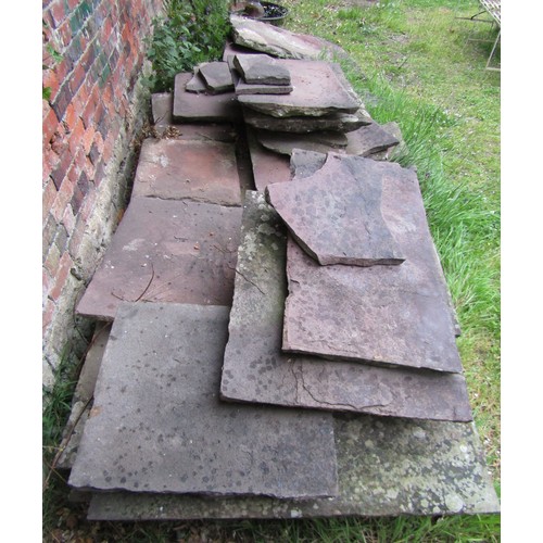 1221 - A large area of natural stone paving slabs