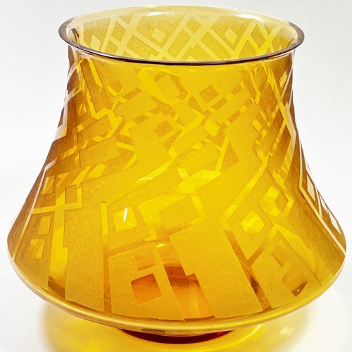 156 - A Daum acid etched amber glass vase of bladed cylindrical form, etched with geometric motifs in the ... 