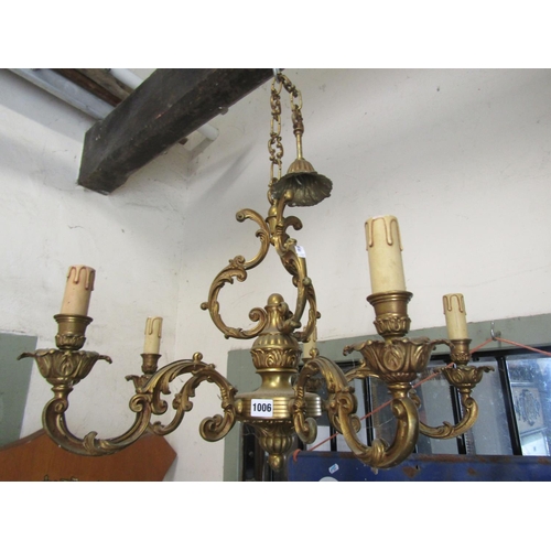 1294 - A good quality cast brass five branch candelabra with scrolling detail, 68cm diameter approx, 50cm h... 