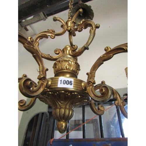 1294 - A good quality cast brass five branch candelabra with scrolling detail, 68cm diameter approx, 50cm h... 