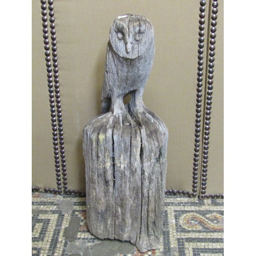 1150 - A large weathered carved oak barn owl, with provenance from the International Centre for Birds of Pr... 