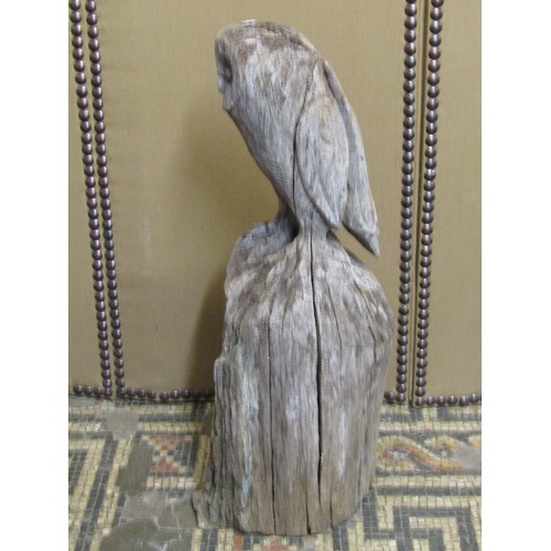 1150 - A large weathered carved oak barn owl, with provenance from the International Centre for Birds of Pr... 