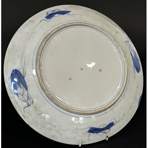 75 - A 19th century Japanese Imari charger with alternating bird and floral detail, 40cm diameter