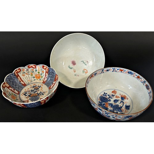 82 - A 19th century Chinese Imari bowl with floral detail and two others