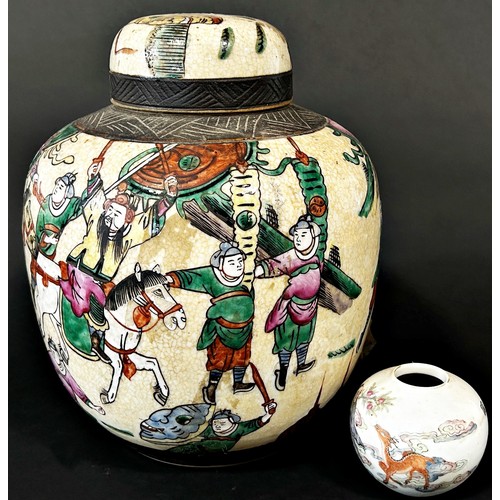 83 - A Japanese crackle glazed ginger jar and cover with warrior detail, and a further Chinese globular v... 