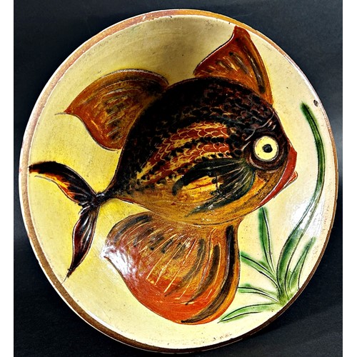 98 - A Puigdemont majolica bowl with fish decoration, 24cm diameter