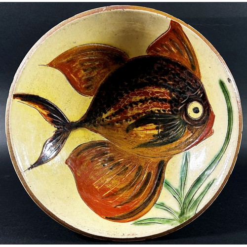 98 - A Puigdemont majolica bowl with fish decoration, 24cm diameter