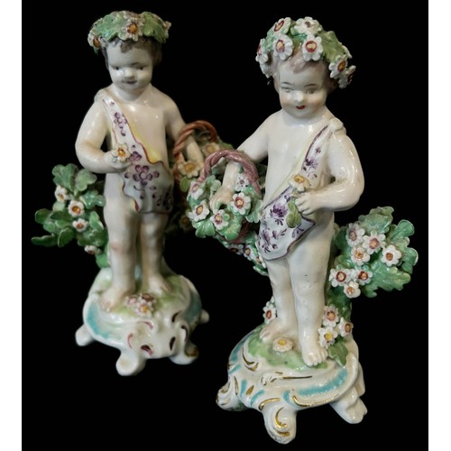 6 - A Coalport floral encrusted vase and cover, 14cm high, together a pair of late 18th century figures ... 