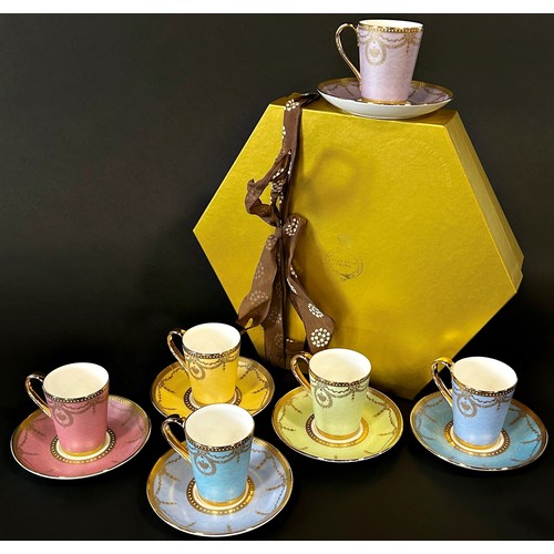 14 - A set of six bone china coffee cups and saucers in various colourways, with gilt overlay - The Royal... 